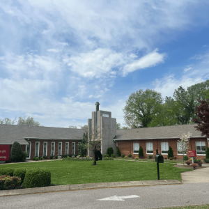 An exterior of a church or religious campus on a bright day.